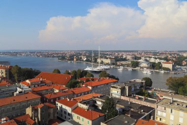 ZADAR, CROATIA - SEPTEMBER 14, 2016: This is a view of the strait between the peninsula and the mainland of the city with a pier and a marina.