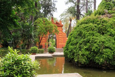 SEVILLE, SPAIN - MAY 21, 2017: This is one of the nooks in the Alcazar Gardens near the Grotto of the Sultans.