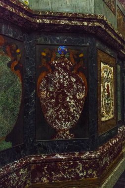 FLORENCE, ITALY - SEPTEMBER 13, 2018: This is a fragment of the marble mosaic in the interior of the Crypt of the Princes of the Medici Chapel.