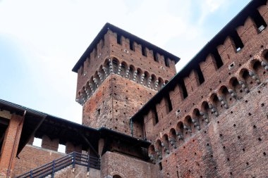 MILAN, ITALY - MAY 10, 2018: These are the walls of the Sforza Castle and the Castellan Tower.