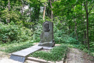 KRASNOKUTSK, UKRAINE - JULY 24, 2021: This is the grave of Ivan Karazin, the founder of the arboretum in Krasnokutsk on the territory of the park itself.