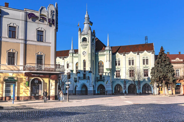 MUKACHEVO, UKRAINE - MARTH 17, 2023: This is the building of the Town Hall in the neo-Gothic style in the historic center of the city.