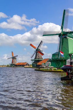ZAANSE-SAENS, NETHERLANDS - MAY 9, 2013: These are windmills, which located in the area of North Holland in a countyside.