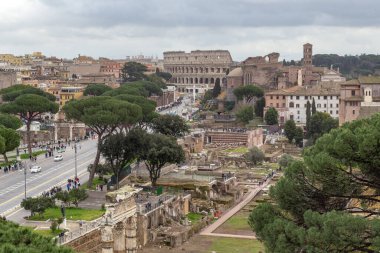 ROME, ITALY - MARTH 10, 2023: This is a view of the Roman Forums and the Colosseum from the top of the Capitoline Hill.