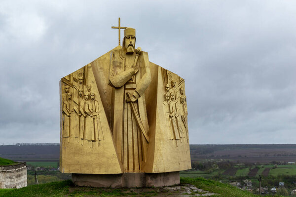 KHOTYN, UKRAINE - APRIL 26, 2023: This is a modern monument to Hetman Peter Sagaidachny at the gates of the Khotyn Fortress.