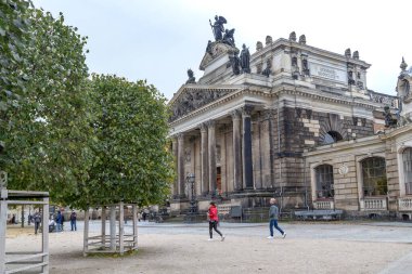 DRESDEN, GERMANY - NOVEMBER 3, 2023: This is a fragment of the facade of the Academy of Fine Arts, located on the Bruhl Terrace. clipart