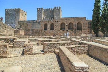 GRANADA, SPAIN - MAY 20, 2017: These are the remains of the structures of the Armory Square of the Alcazaba fortress in the Alhambra. clipart