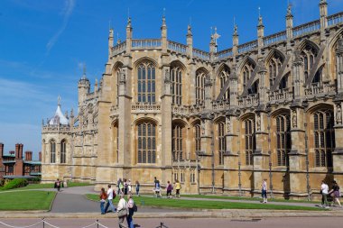 WINDSOR, GREAT BRITAIN - MAY 19, 2014: This is a fragment of the Gothic Chapel of St George in the Lower Yard of Windsor Castle. clipart