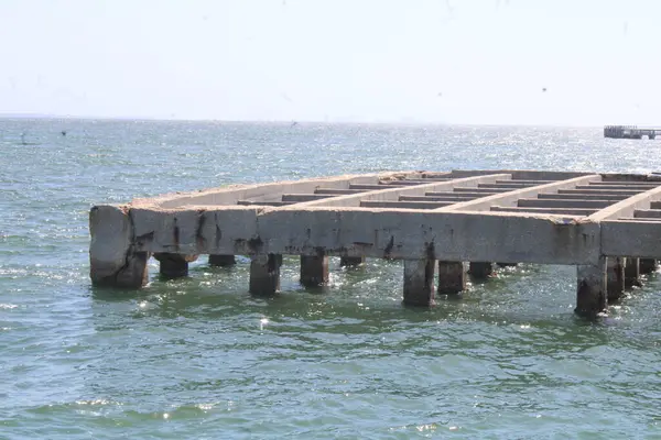 stock image Old Ruins In The Water On The Coast Of Fort Pickens National Seashore In Pensacola Florida,