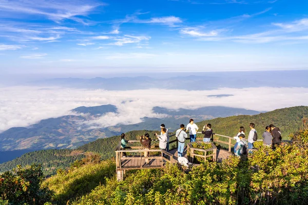 stock image Chiang Mai, Thailand - 2 November 2022 - Visitors taking their morning sunrise pictures at the viewpoint area of the beautiful Kew Mae Pan Nature Trail on Doi Inthanon mountain in Chiang Mai, Thailand