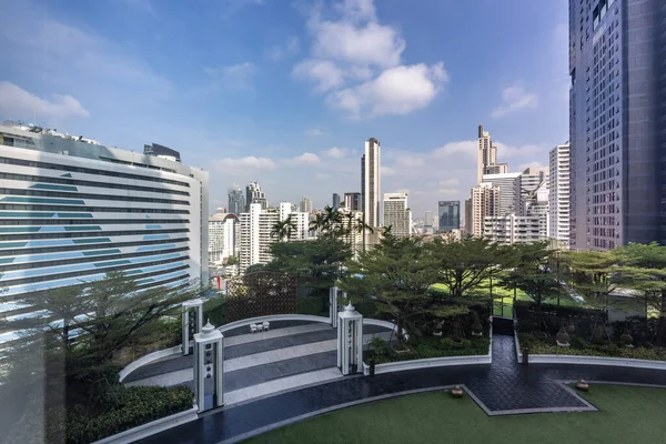 stock image Bangkok, Thailand - 13 January 2023 - View of Bangkok high-rises on cloudy day with white clouds moving across the sky