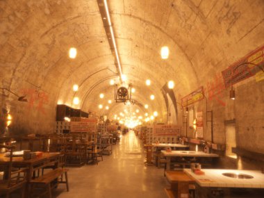 Filmed on November 2, 2024 in Chongqing, China. In Chongqing, some air raid shelters from World War II have been transformed into hotpot restaurants, becoming famous tourist and culinary destinations. clipart