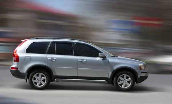 stock image Toyota silver car on a motion blurred background.