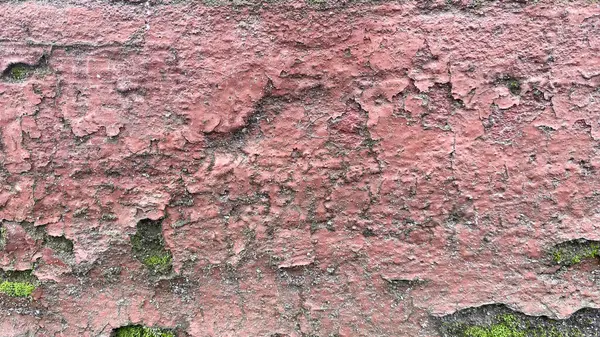 Kırmızıyla boyanmış eski beton dokusu