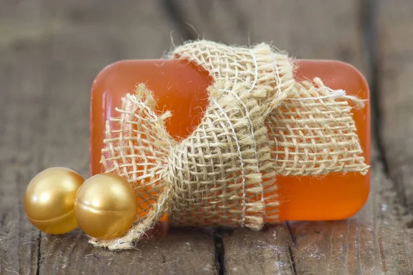 bar of glycerine soap and bath pearls