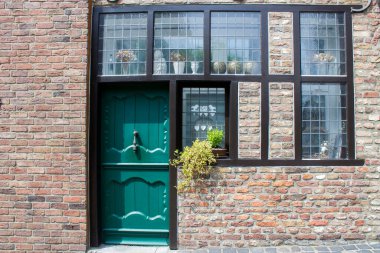 Beautiful brick house facade, Brueggen, North-Rhine Westphalia, Germany clipart