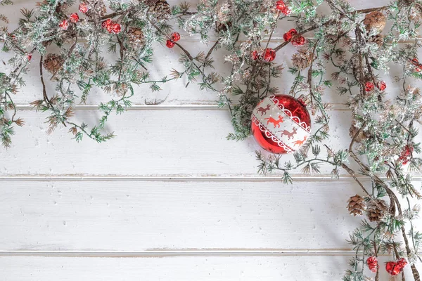 stock image Christmas fir tree with decoration on white wooden board