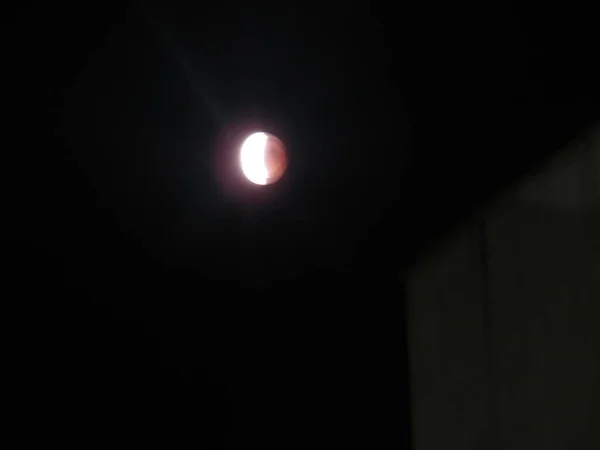Photo of the lunar eclipse in the sky at night - July 2018