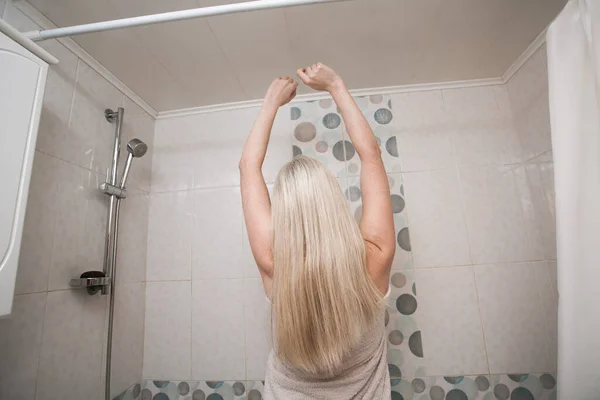 Positive Beautiful Woman Blond Hair White Towel Stands Bath Stretches — Stock Photo, Image