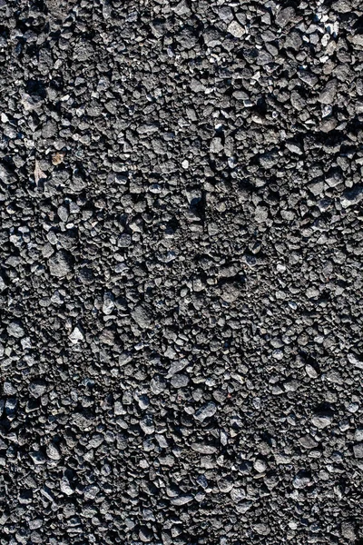 stock image Surface grunge rough of asphalt, texture background, tarmac grey grainy road, top view. An image as a background for your design and creative illustrations.