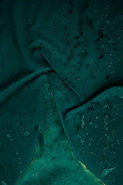 Droplets Water Lie Wet Crumpled Green Cloth Dark Creative Image — Stockfoto