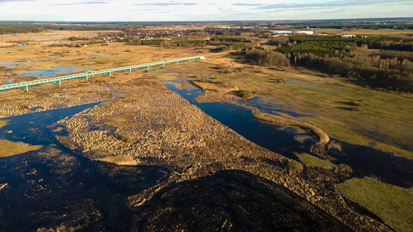 View from above on the bridge over the Narew River and backwater on a sunny day.