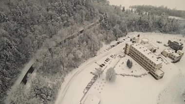 Aerial view of the Poprad Landscape Park in Beskid Sadecki on a snowy winter day.