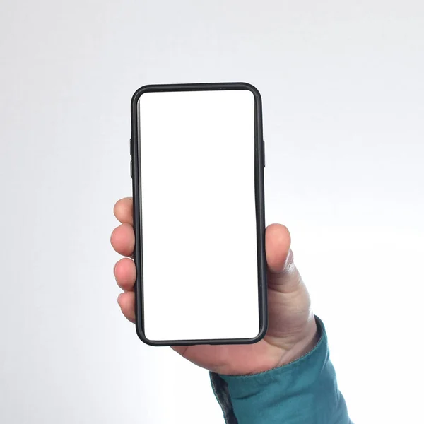 Man Hand Hålla Telefon Med Tom Vit Skärm — Stockfoto