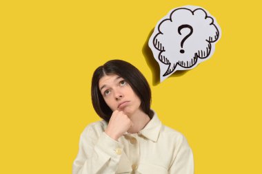 thoughtful young woman on yellow background, question mark clipart