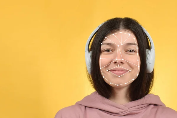 portrait of pretty woman and face recognition system