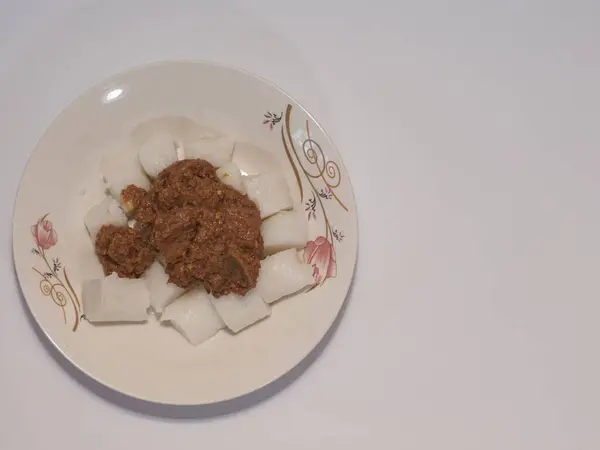 stock image Traditional Indonesian Rendang with Lontong Rice Cakes