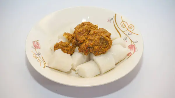 stock image Traditional Indonesian Rendang with Lontong Rice Cakes