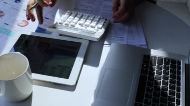 Financial accountant calculates accounts and statistics financial statements