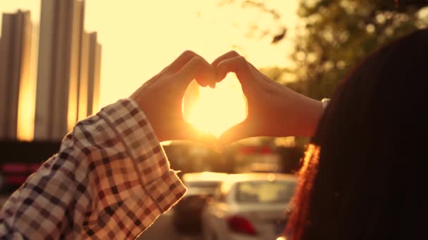 Woman Gestures Love Beautiful Sunset — Wideo stockowe