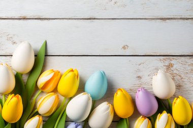 Multicolored tulips on a white wooden background top view. Mothers day, Valentines Day, Birthday. Generative AI.