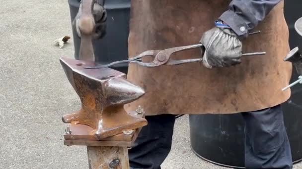 Blacksmith Uses Hammer Forge Metal Male Blacksmith Forges Hot Metal — Stock Video