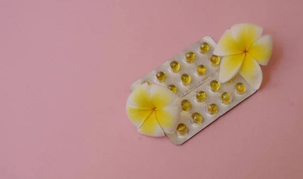 Pills Pink Background Fish Oil Birth Control Pills Delicate Plumeria — Stock Photo, Image