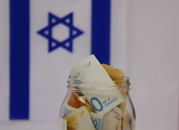 Vaso Vetro Con Shekel Israeliano Sullo Sfondo Della Bandiera Israele — Foto Stock