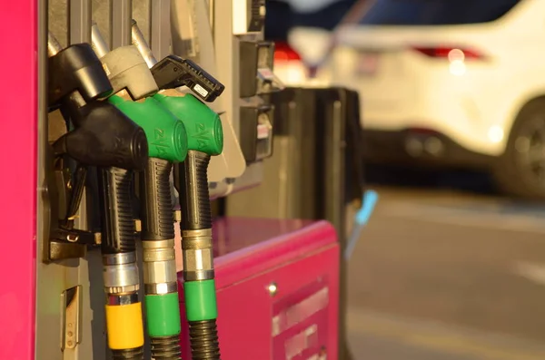 stock image Refuel fill up with petrol gasoline. Petrol pump filling fuel nozzle in gas station. Petrol industry and service. Petrol price and oil crisis concept.