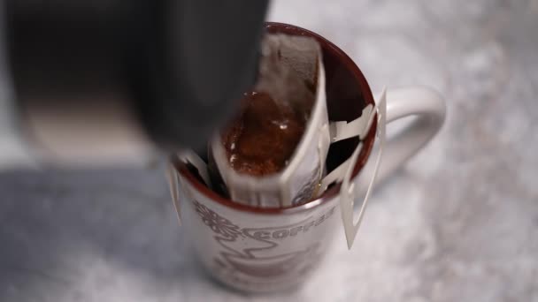 Drip Coffee Bag Brews Coffee Glass Mug Close — Stock Video
