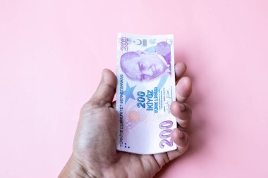 Pembe arka planda 200 Lira banknot, Pembe arka planda 200 Lira banknot, Pembe arka planda 200 Lira,.