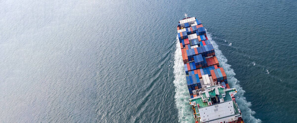 Aerial view container cargo ship, Global business import export logistic and transportation freight shipping of international by container cargo ship in the open sea, Container cargo vessel freight shipping.