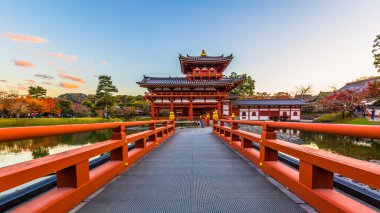 Byodo-in Temple in Kyoto, Uji, Japan, Byodo-In or Byodoin temple Unesco World Heritage Site, Kyoto, Japan, The Phoenix Hall of Byodoin, Uji, Kyoto, Japan. clipart