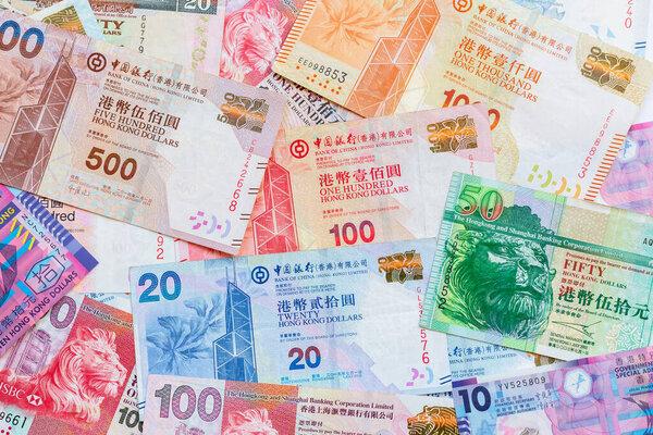 Hong Kong Dollar banknotes money currency white background, Hong Kong banknotes HKD currency financial and business, Hong Kong banknotes cash money currency with copy space.
