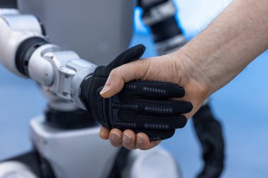 İnsan robot işbirliği gelecekteki teknoloji sinerji sektörü, yenilikçi ortaklık insan ve robot sinerji işi, el sıkışma adam ve robot makine, iş teknolojisi ile tanışıyor