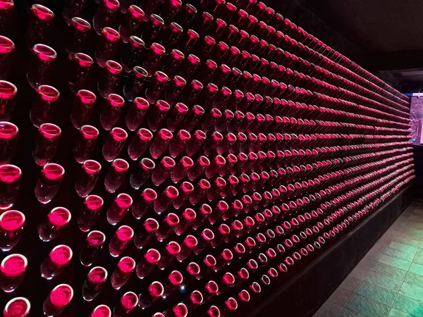 Old Cellar Red Illuminated Stacked Bottles Winery Greece — Stock Photo, Image