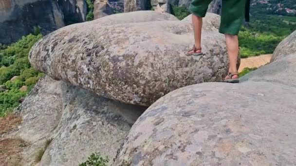 Woman Looking Spectacular Meteora Rock Formations Hosting Orthodox Christian Monasteries — Video