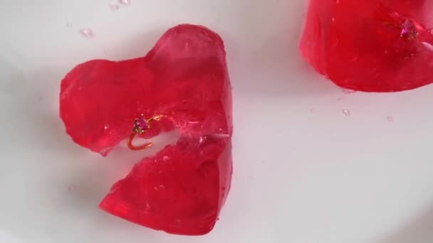 Valentine Composition Red Heart Shaped Jelly Piece Containing Golden Ring — Video