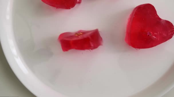 Valentine Setup Red Heart Shaped Jelly Piece Containing Golden Ring — 图库视频影像