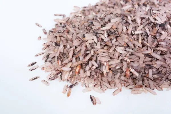 stock image Thai Riceberry rice : Close-up pile of rice called riceberry rice , rice with high nutrients  on white background.